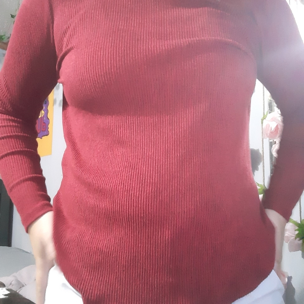 Long sleeved, red sweater